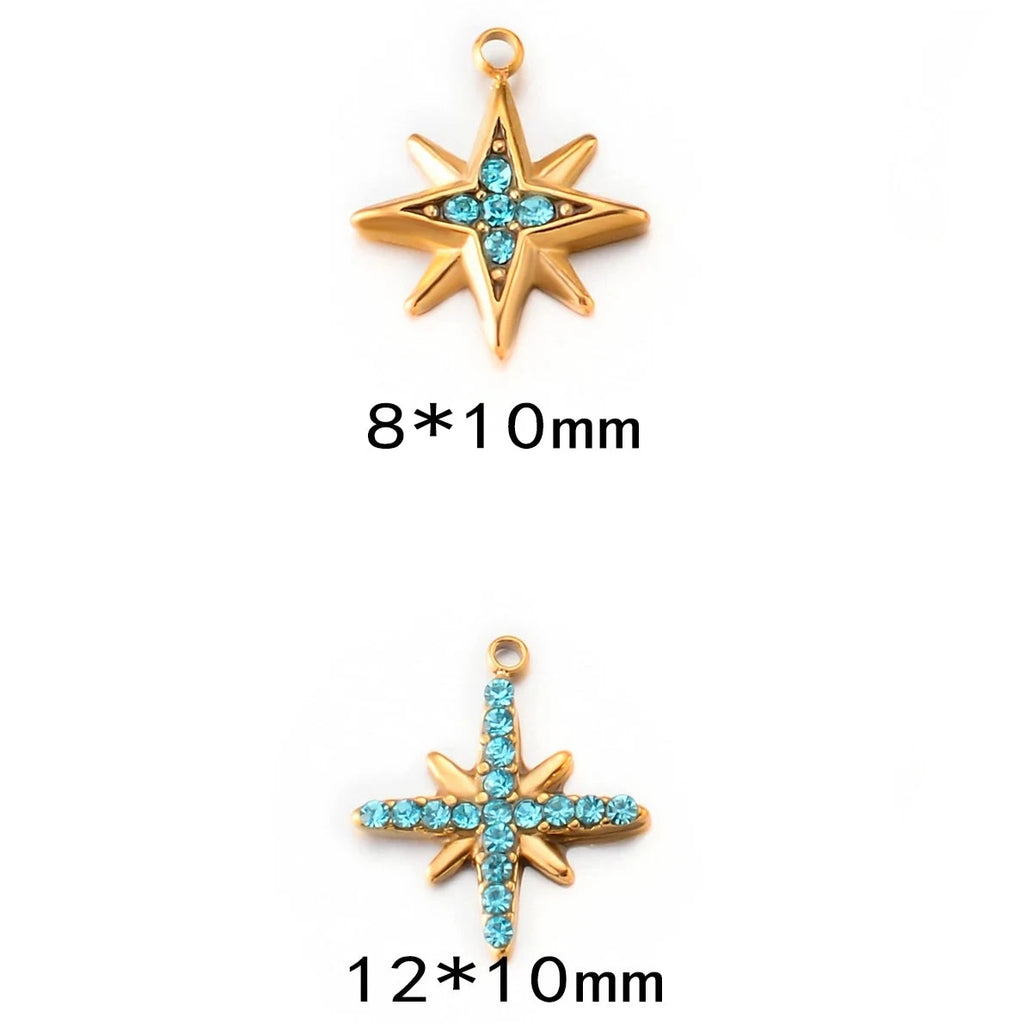 Detailed view of starburst charm with turquoise rhinestones. A023.