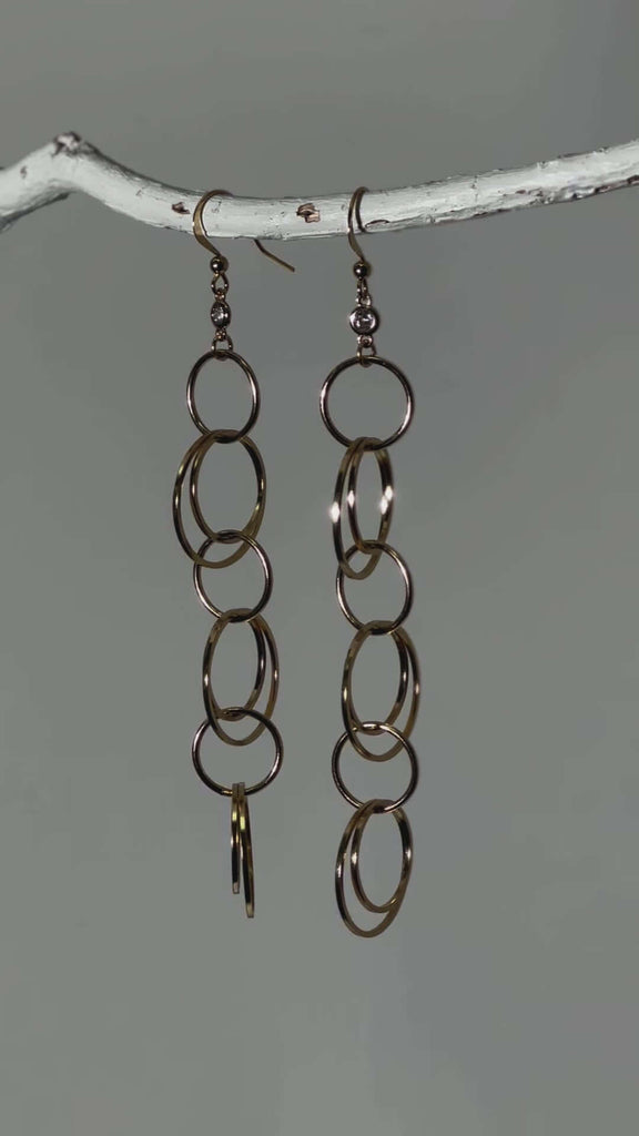 Elegant Circle of Life Earrings with a polished finish, perfect for adding a touch of sophistication to any outfit.